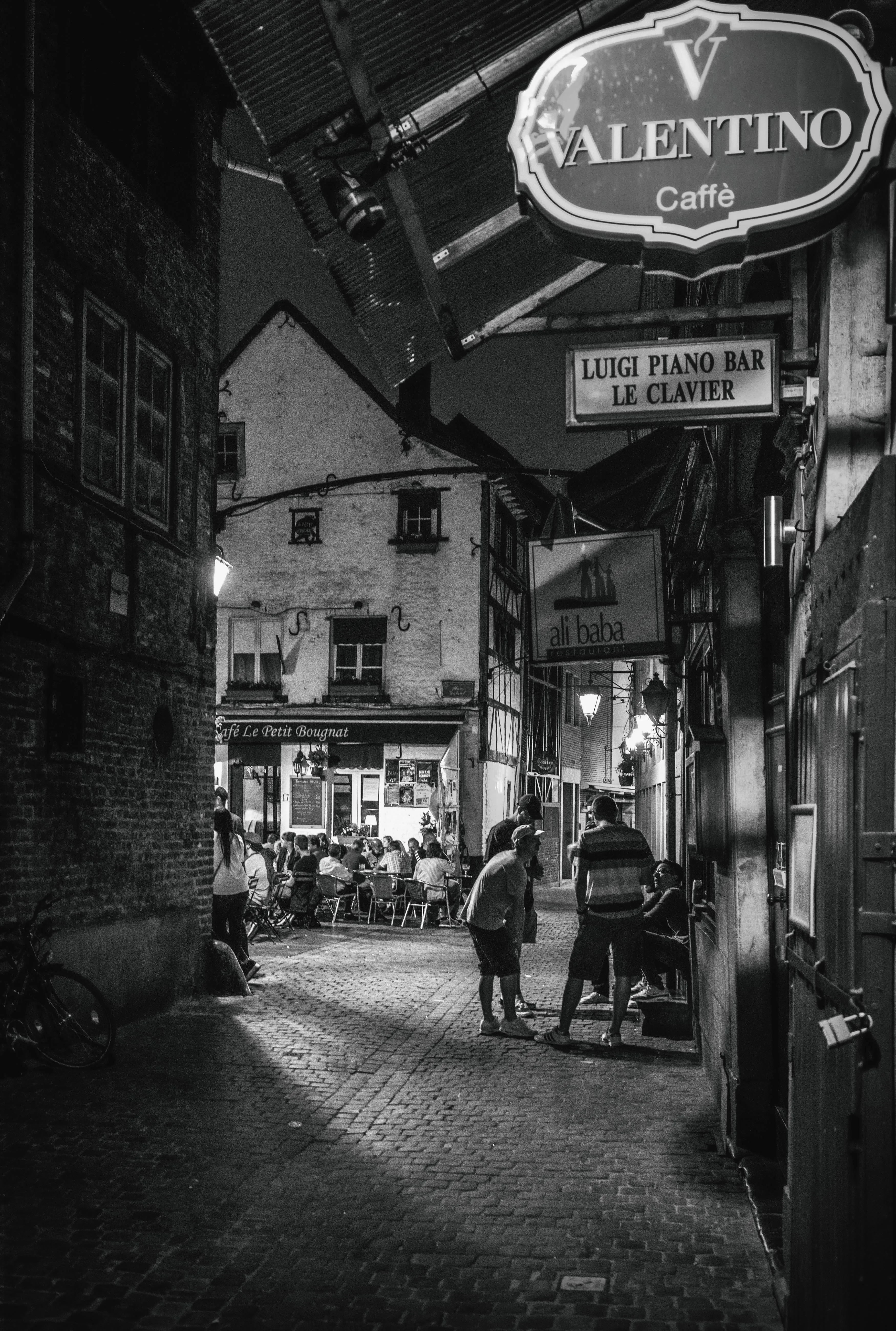 Lit terraces and signage, Liège by night